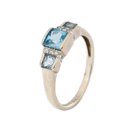 251 - 9ct gold ring set with diamonds and topaz, 2.2 grams, size N.