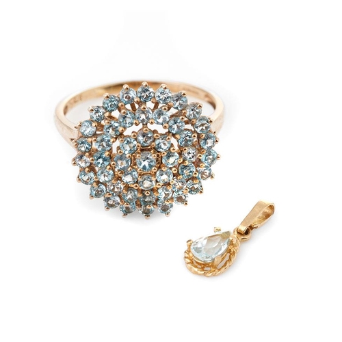 252 - 9ct gold ring set with light blue stones together with a matching pendant, 3.8 grams (2).