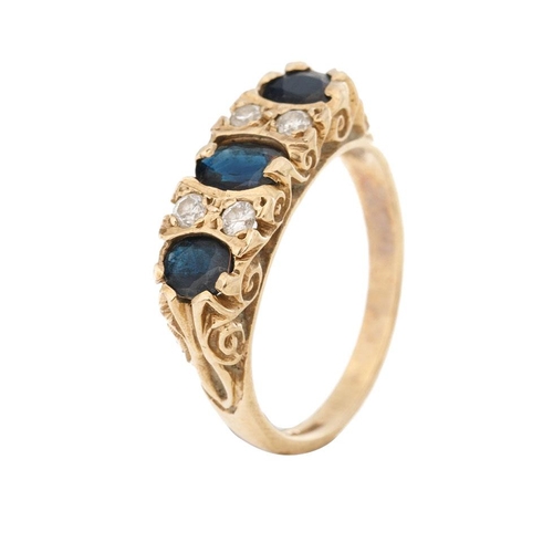 259 - 9ct gold ring set with 4 diamonds and 3 larger sapphires, 3.6 grams, size P.