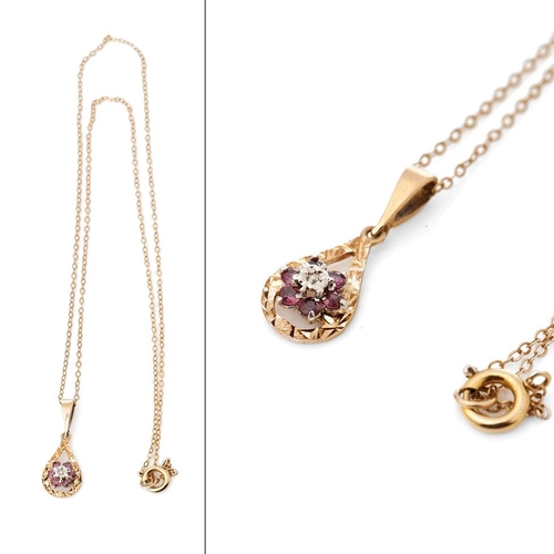 262 - 9ct gold pendant set with a diamond and amethysts on 9ct gold chain, 1.9 grams, chain length 41cm.