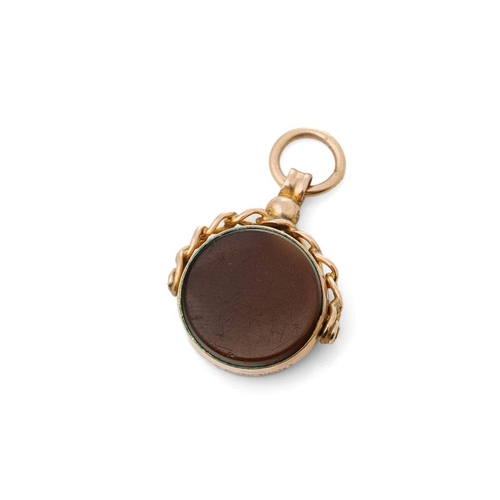 282 - 9ct gold and hardstone spinning fob, 4.1g