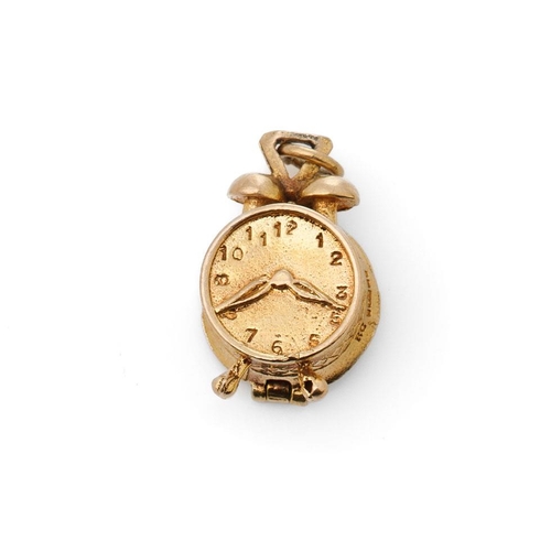 288 - 9ct gold charm in the form a mantle clock, opens to rear, 5.0 grams.