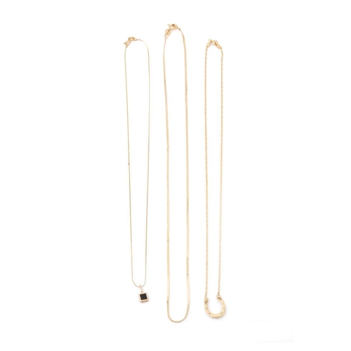 296 - A trio of 9ct gold necklaces, 2 with pendants, one in the form of a horseshoe, combined weight 5.1 g... 