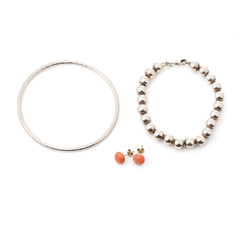 306 - Jewellery to include a pair of coral ear studs, a silver bangle and a silver bead bracelet, 22.2 gra... 