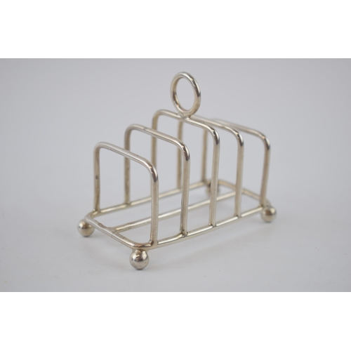 107 - Silver 5 bar toast rack, Birmingham 1926, Mappin and Webb, 59.9 grams.