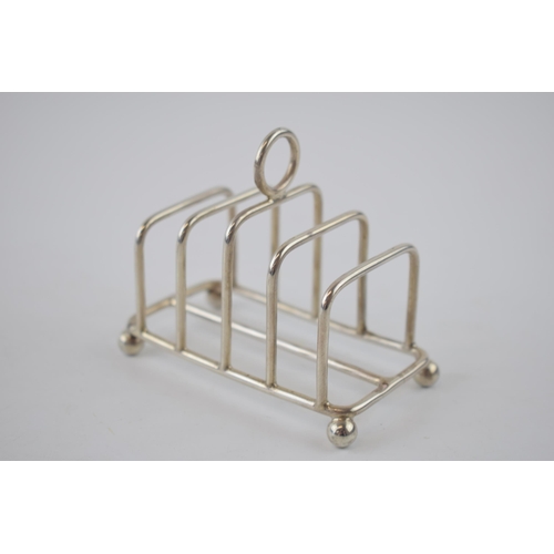 107 - Silver 5 bar toast rack, Birmingham 1926, Mappin and Webb, 59.9 grams.