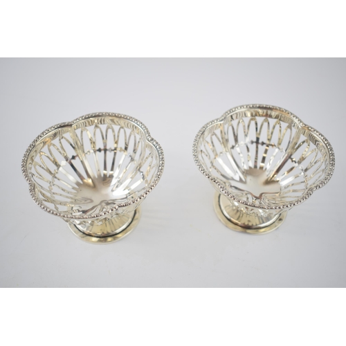 109 - A pair of ornate bon bon dishes, with pierced decoration, Birmingham 1921, W&S, 88.7 grams (2).