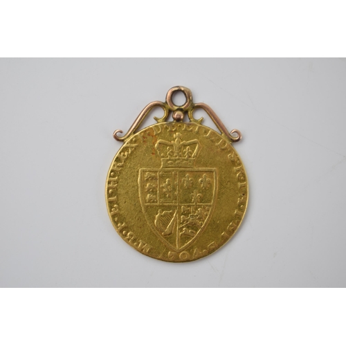 11 - Full Guinea pendant 1794. Coin is 22ct gold with 9ct gold scroll top mount, weight 8.62