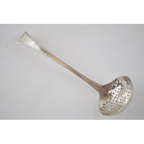 126 - Silver sugar sifter ladle, London 1827, Thomas Dicks, 32.6 grams.