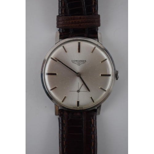 172 - Gentleman's vintage Longines wrist watch, comprising a round dial with applied baton markers and sub... 