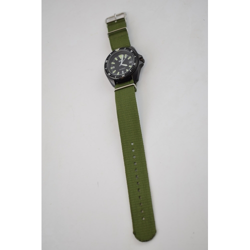 185 - MWC MIL DIVER Automatic date military style watch on green Nato style strap. Rotational bezel with l... 