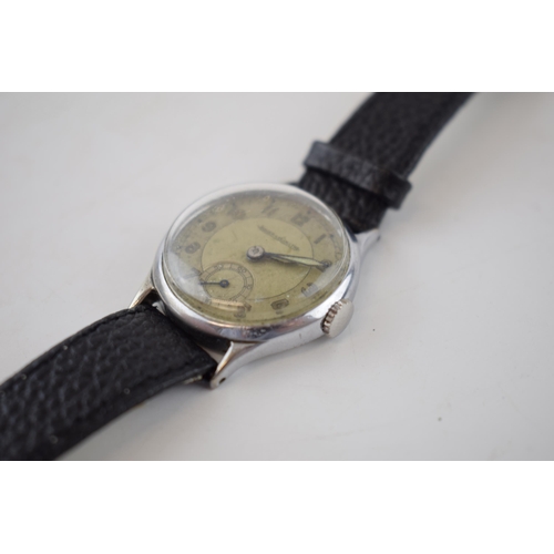 186 - Gentleman's vintage Jaeger Le Coultre wrist watch, comprising a round silver tone dial with luminous... 