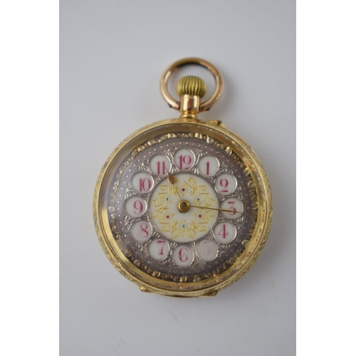 189 - 18ct ladies pocket watch with enamelled ceramic face. Case diameter 35mm. Weight 32.3g.