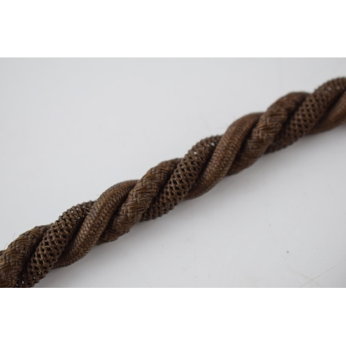 196 - Early Victorian mourning watch chain made with finely plaited hair and gold mounts (test as 9ct or b... 