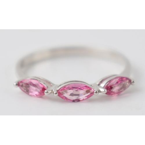 200 - 18ct white gold ladies ring set with padparadscha sapphires, size O, 1.5 grams.