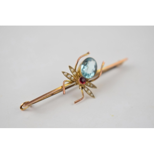 202 - 9ct gold bar brooch in the form of a spider set with pearls and similar stones, 3.3 grams, 58mm wide... 