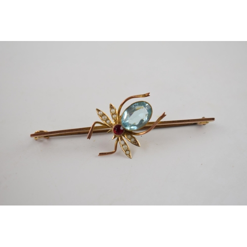 202 - 9ct gold bar brooch in the form of a spider set with pearls and similar stones, 3.3 grams, 58mm wide... 