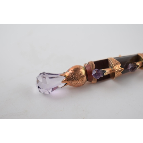 205 - Victorian 9ct gold sword brooch set with agate and amethysts, 85mm wide, 12.2 grams.