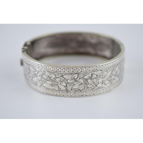 226 - Wide silver bangle, 18.3 grams, no hallmarks.