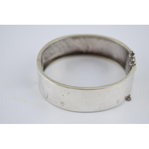 226 - Wide silver bangle, 18.3 grams, no hallmarks.