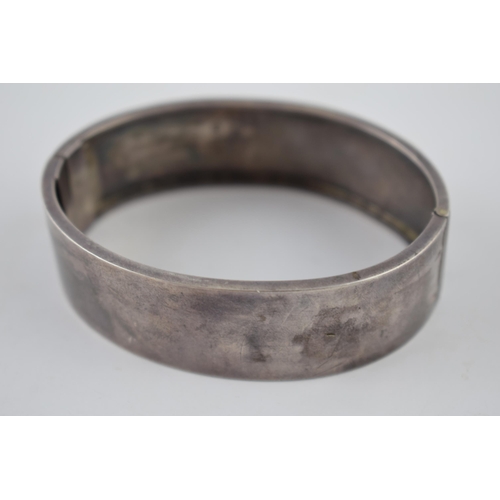 227 - Wide silver bangle, 21.2 grams.