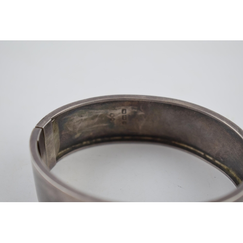 227 - Wide silver bangle, 21.2 grams.