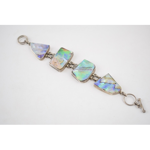 230 - Silver 925 chunky ladies bracelet set with abalone panels, 32.9 grams, 21cm long.