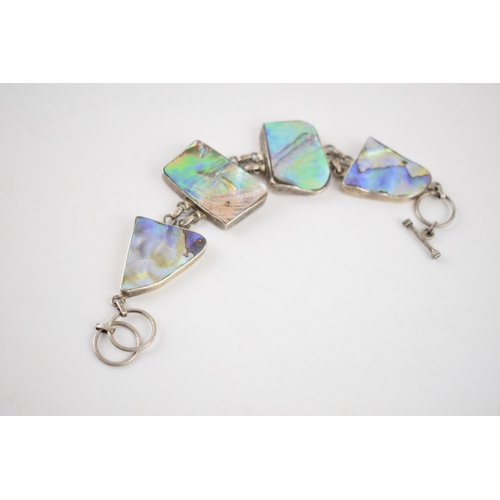 230 - Silver 925 chunky ladies bracelet set with abalone panels, 32.9 grams, 21cm long.