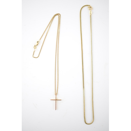 245 - Two 9ct gold necklaces, one with a cross, both marked 375. Total weight 6.2g