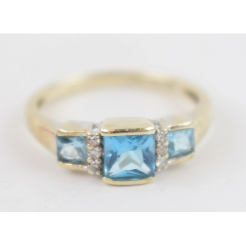 251 - 9ct gold ring set with diamonds and topaz, 2.2 grams, size N.