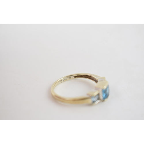 251 - 9ct gold ring set with diamonds and topaz, 2.2 grams, size N.