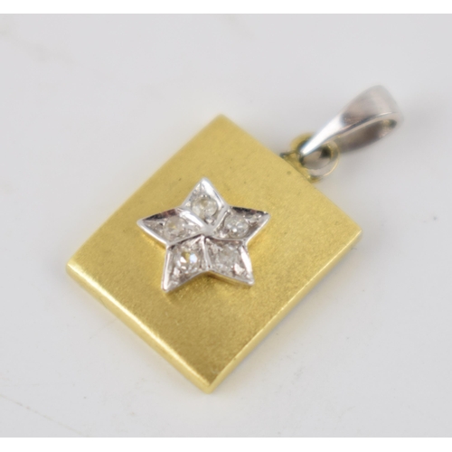 260 - 18ct gold pendant set with diamonds in the form of a star, 1.9 grams, 20mm tall.