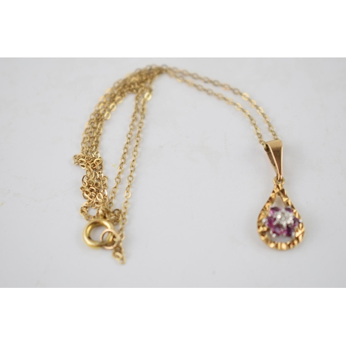 262 - 9ct gold pendant set with a diamond and amethysts on 9ct gold chain, 1.9 grams, chain length 41cm.