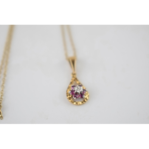 262 - 9ct gold pendant set with a diamond and amethysts on 9ct gold chain, 1.9 grams, chain length 41cm.