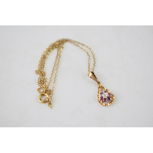 262 - 9ct gold pendant set with a diamond and amethysts on 9ct gold chain, 1.9 grams, chain length 41cm.