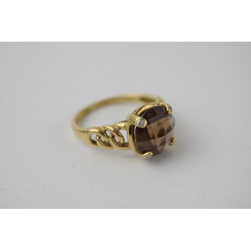 266 - 9ct gold ring with ornate shoulders set with smoky quartz and illusion set diamonds, 4.4 grams, size... 