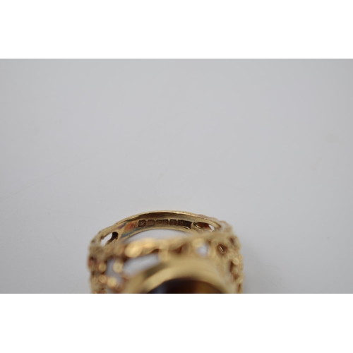 268 - 9ct gold ornate ring with tiger's eye, 8.8 grams, size O/P.