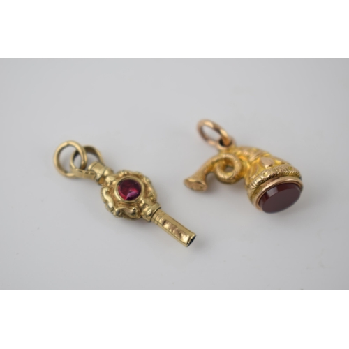 285 - 19th century gold and hardstone watch key combined weight 3.66g, together with un-hallmarked hardsto... 