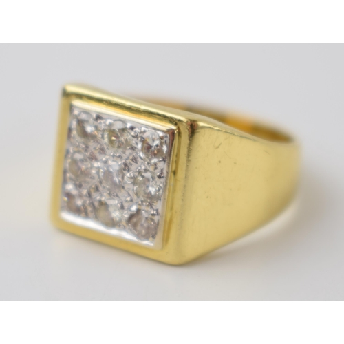 286 - Gents yellow gold 18ct dress ring set with 9 diamonds in a white gold setting.  Ring size Q, weight ... 