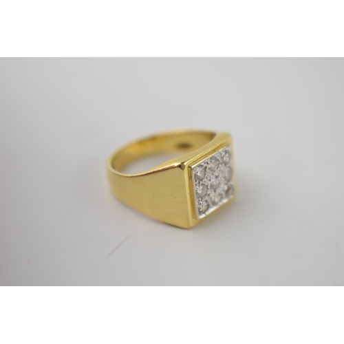 286 - Gents yellow gold 18ct dress ring set with 9 diamonds in a white gold setting.  Ring size Q, weight ... 