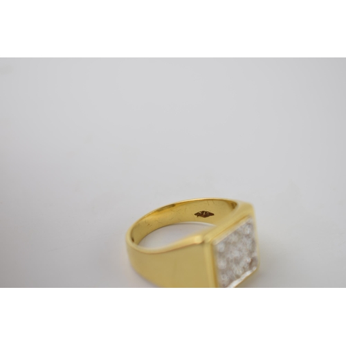 286 - Gents yellow gold 18ct dress ring set with 9 diamonds in a white gold setting.  Ring size Q, weight ... 