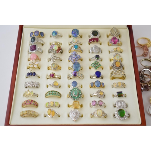 293 - An good collection of over 75 sterling silver gemset ring to include various styles and sizes, some ... 