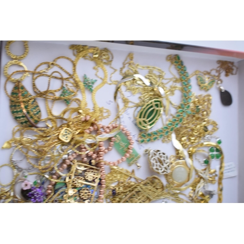 295 - A large collection of silver and gold on silver jewellery to include pendants, chains, necklaces, ea... 