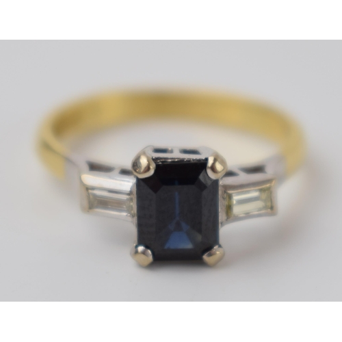 300 - 18ct gold and platinum ladies ring flanked by rectangular diamonds and a central sapphire, size L, 3... 