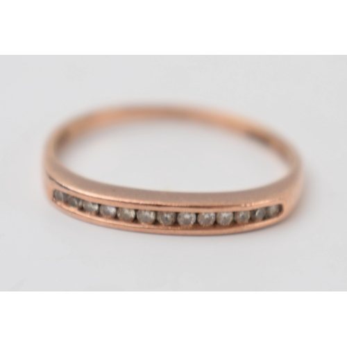 303 - 9ct rose gold diamond half eternity ring, 1.4 grams, size P.