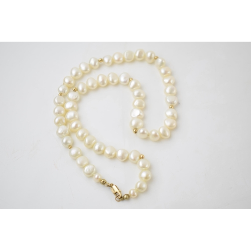 305 - 9ct gold clasp on fresh water pearls, total weight 26.3 grams, 42cm long.