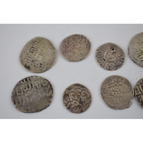 33 - An interesting collection of foreign silver hammered coins and tokens, 23.5 grams (Qty).