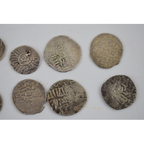 33 - An interesting collection of foreign silver hammered coins and tokens, 23.5 grams (Qty).