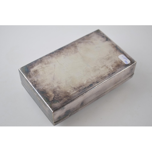 40 - Silver plated cigarette box with enamelled decoration with Dutch scenes, 14cm x 8.5cm.