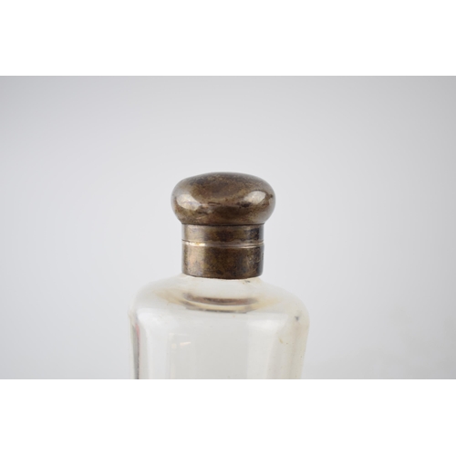 45 - Edwardian silver topped glass saddle flask with original leather saddle case, Birmingham 1905.